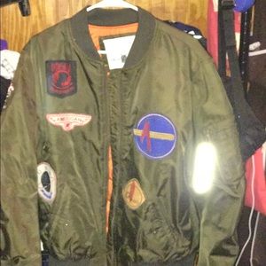 Green bomber flight jacket